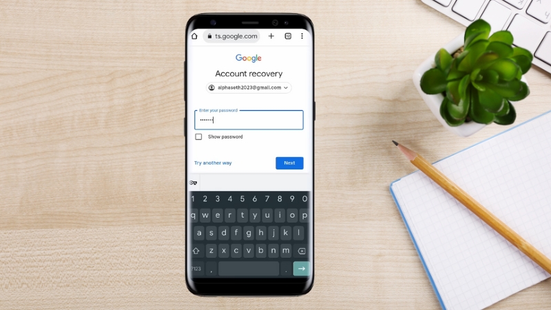 Phone screen on Google account recovery page prompting the user to enter a previous password
