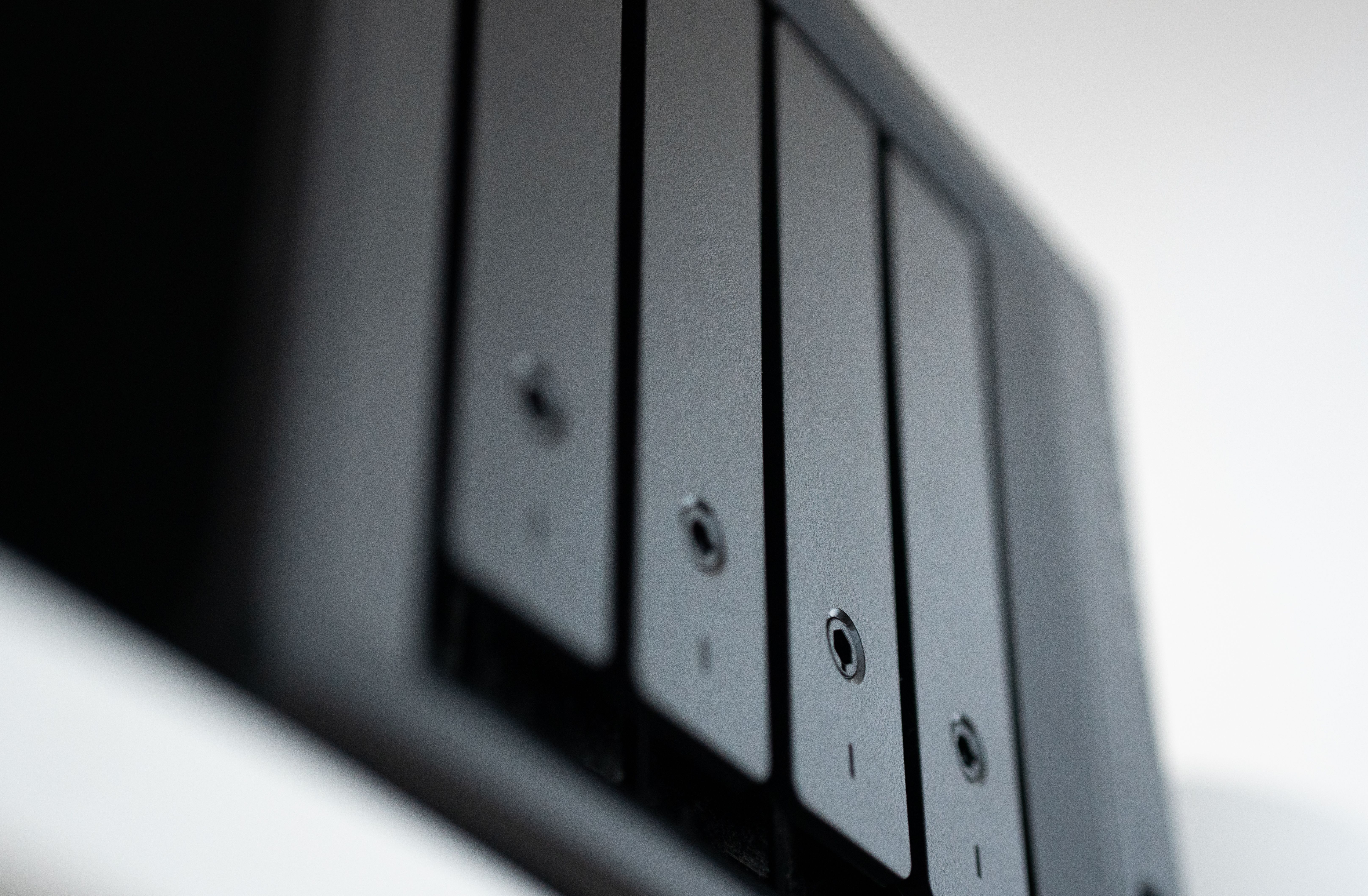 Detailed view of a black data storage unit representing cloud backup and file storage