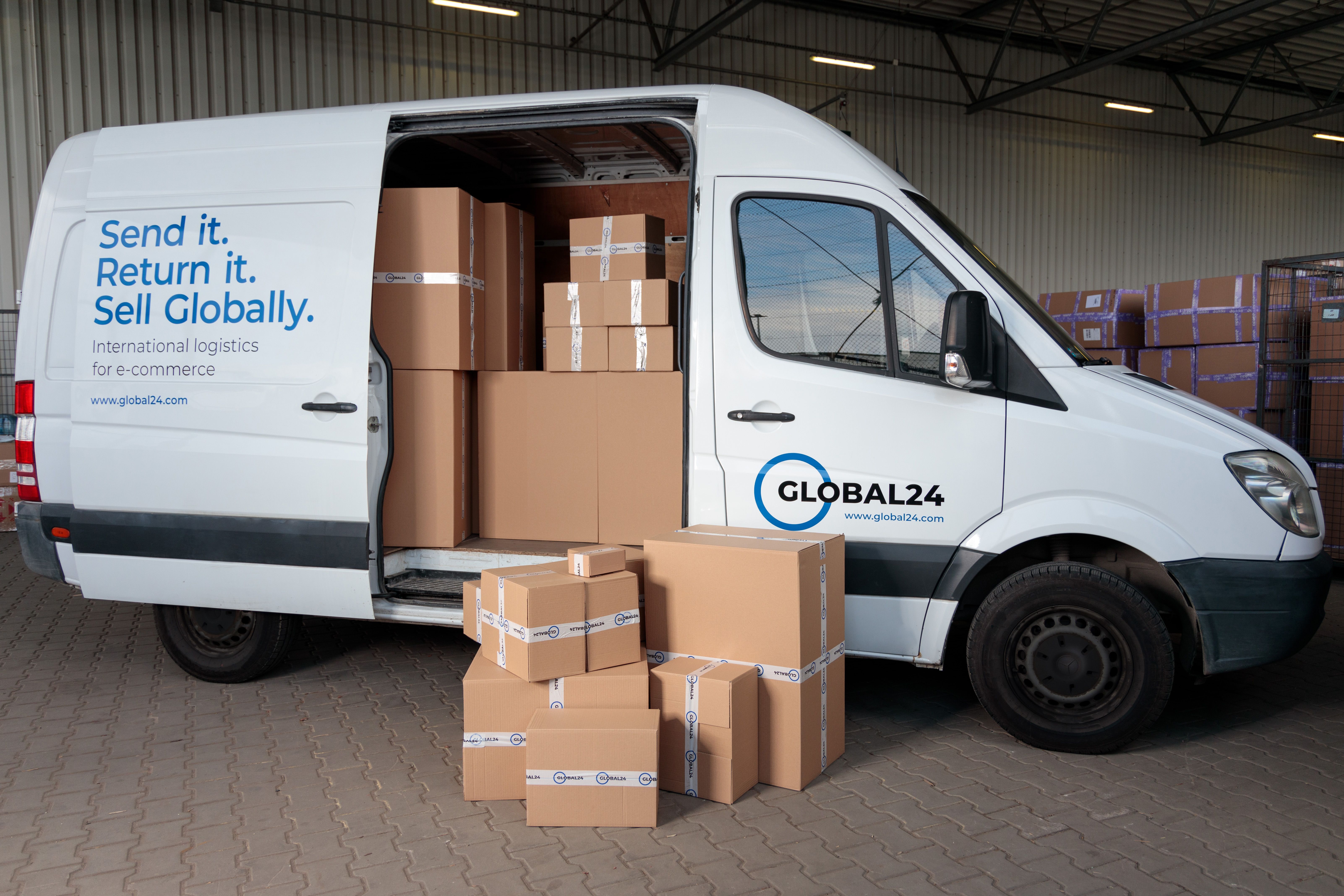 Delivery van loaded with cardboard boxes ready for B2B shipment logistics