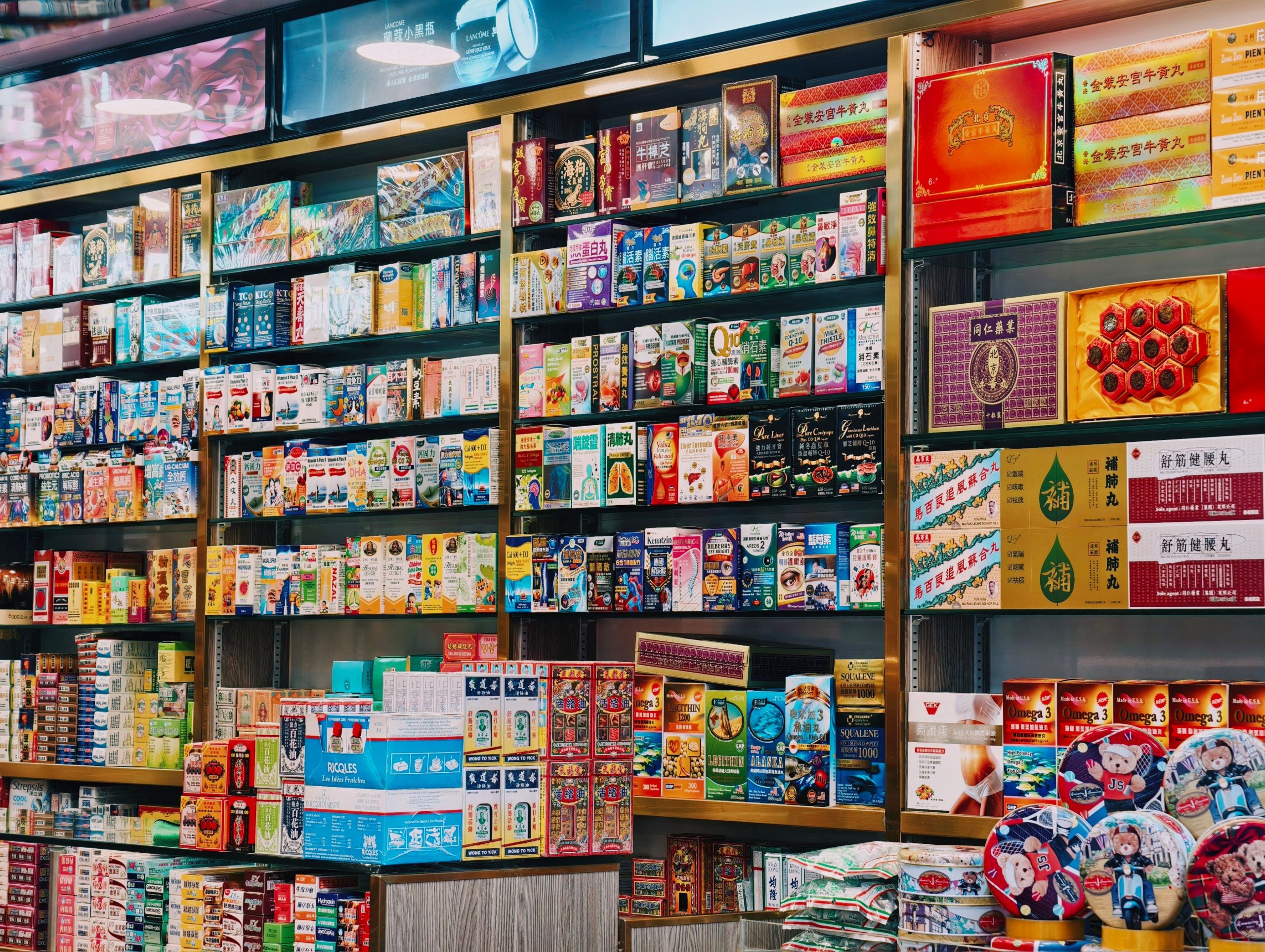 Bright, colorful display of assorted products arranged on supermarket shelves, illustrating strategic retail merchandising