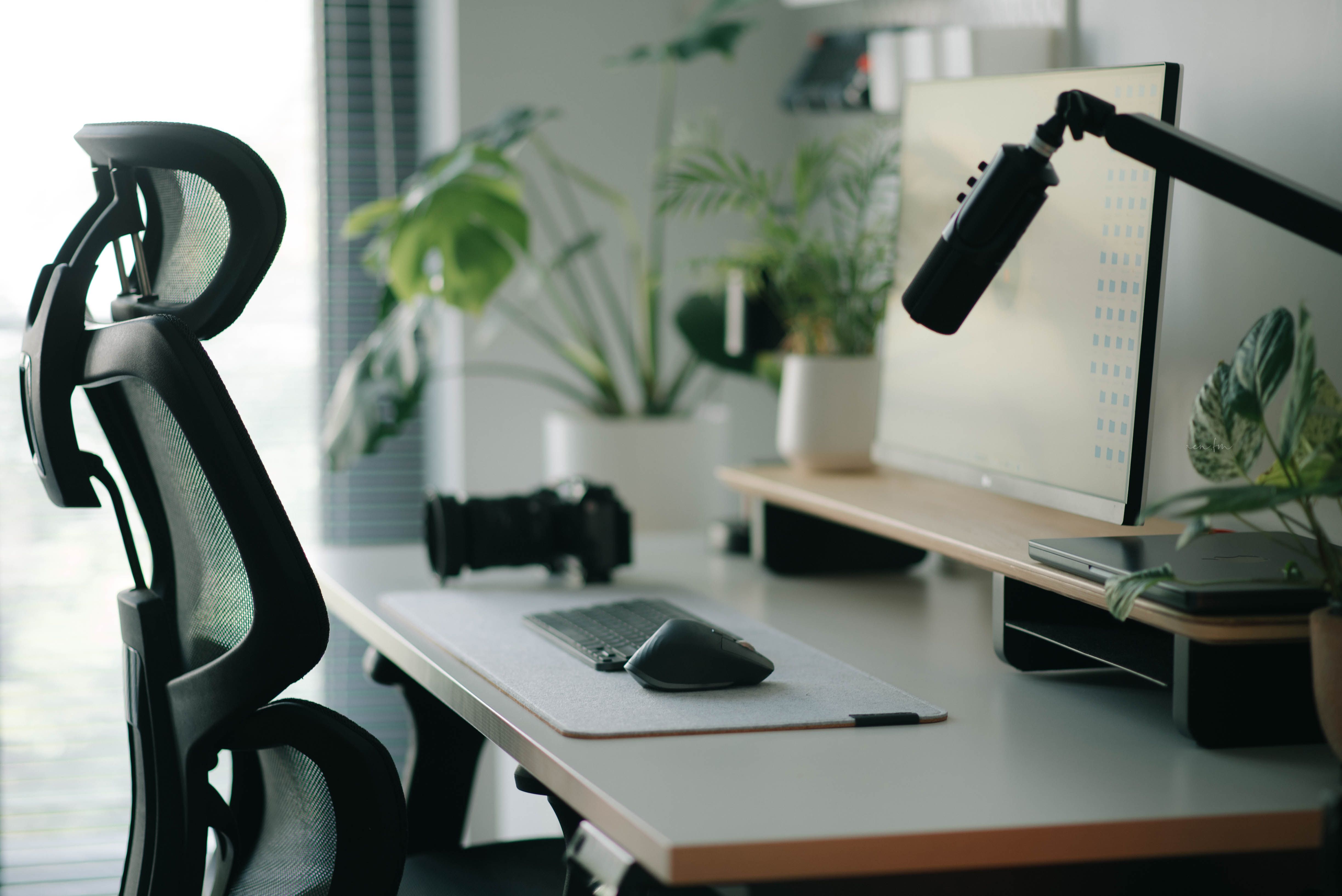 Office setup with ergonomic chair and desk accessories for workplace ergonomics